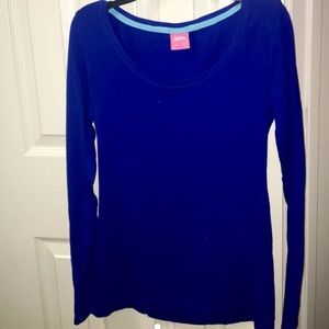 A long sleeved blue shirt